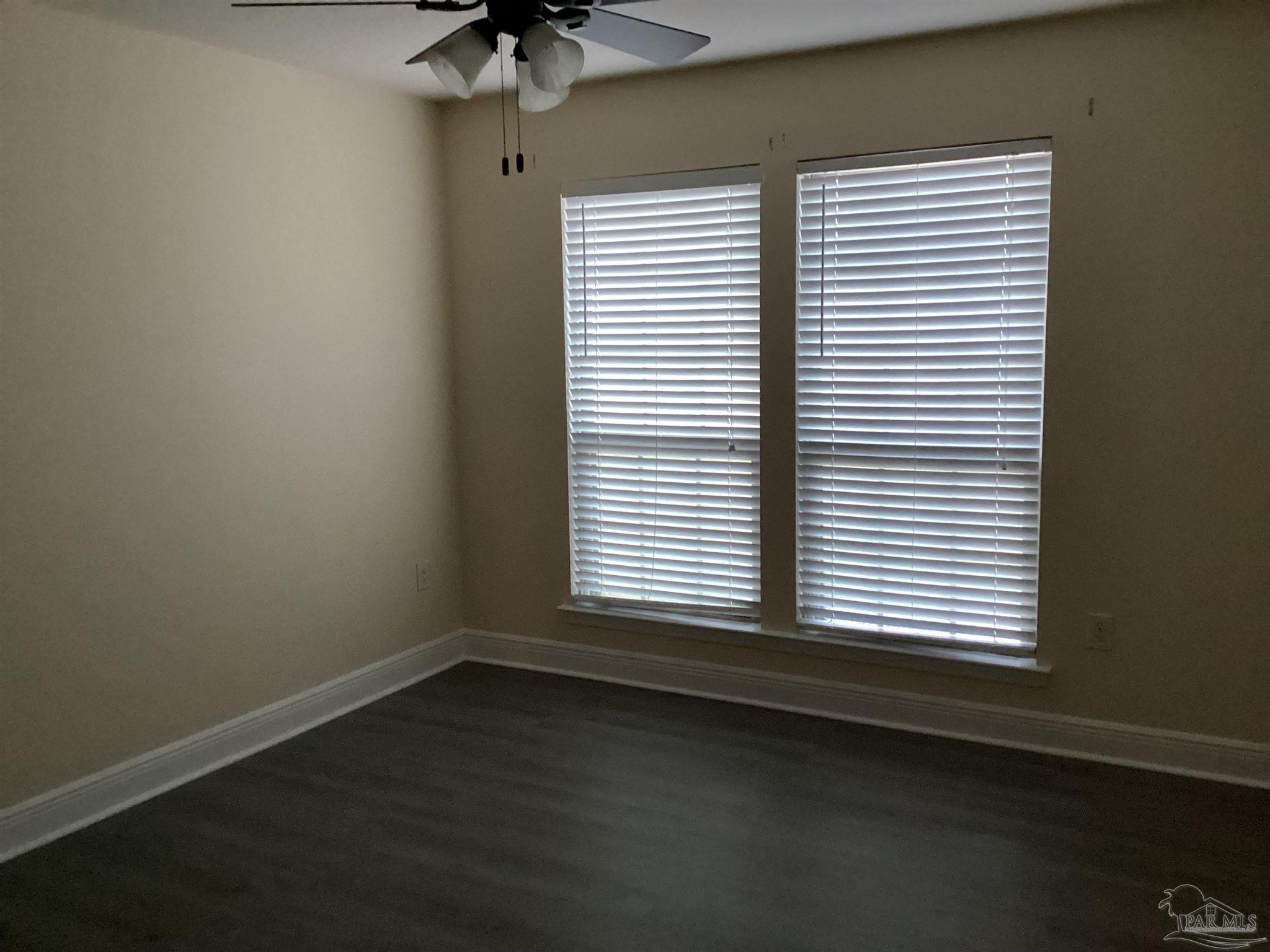 196 Millet Circle Cantonment, FL 32533 - Photo 15 of 20 an empty room with a window