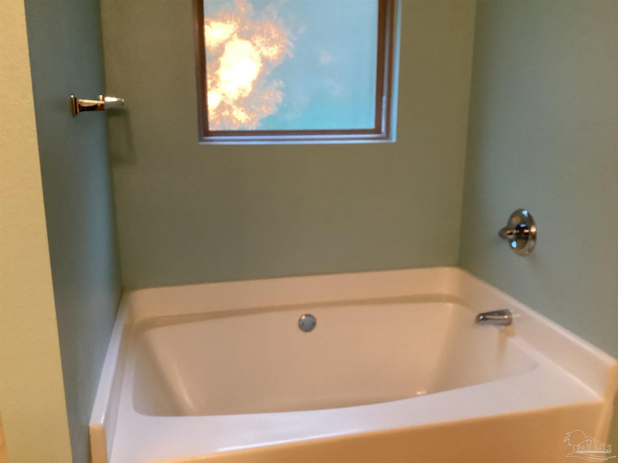 196 Millet Circle Cantonment, FL 32533 - Photo 20 of 20 a bathroom with a tub