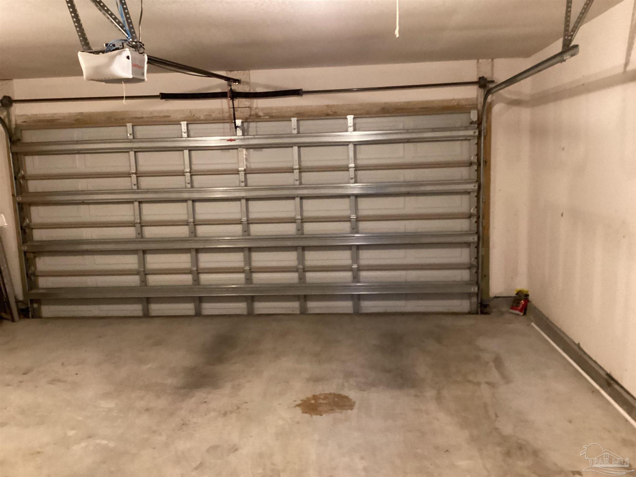 196 Millet Circle Cantonment, FL 32533 - Photo 10 of 20 a view of a room with racks on the wall