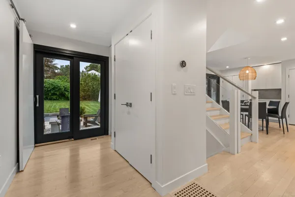 a view of entryway with furniture and a window