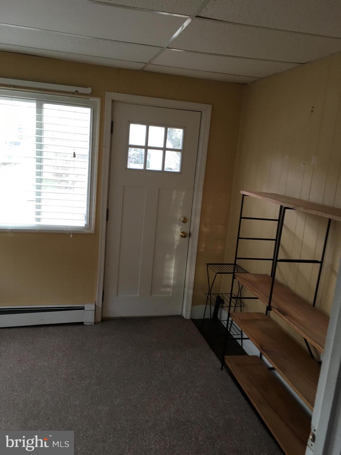 114 Sylvan Avenue Rutledge, PA 19070 - Photo 21 of 26 Front enclosed Porch