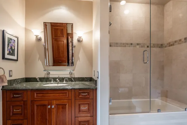 a bedroom with bed and a window