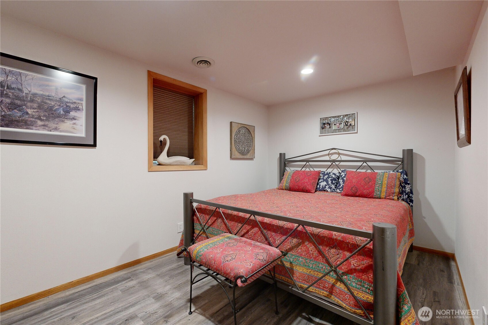 2425 Country Club Road Walla Walla, WA 99362 - Photo 27 of 39 a bedroom with a bed and wooden floor