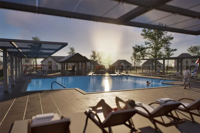 a view of a swimming pool with a patio