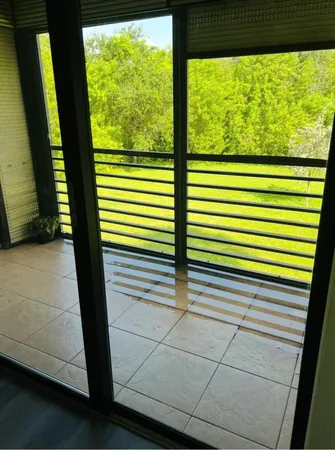 a view of a room with a window