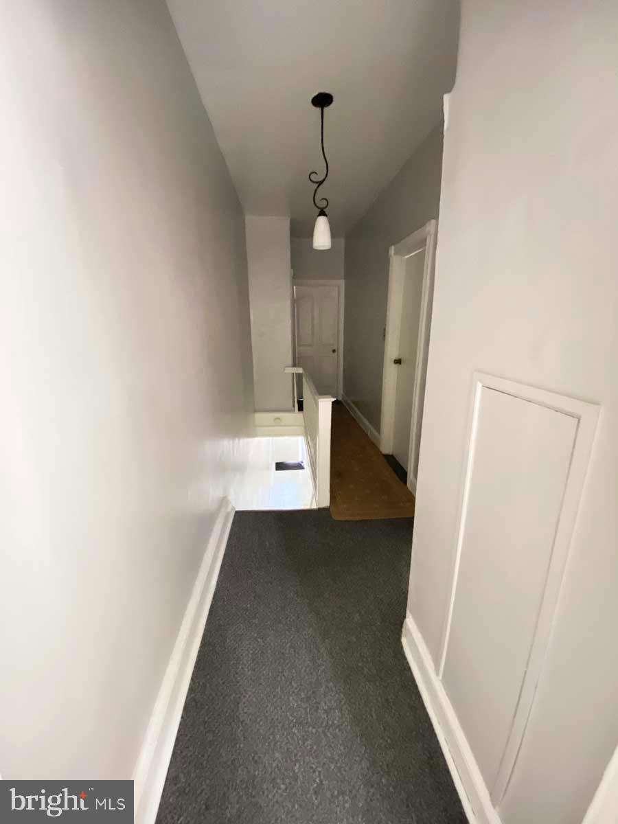 538 West Pike Street Philadelphia, PA 19140 - Photo 11 of 34 a view of a hallway with wooden floor