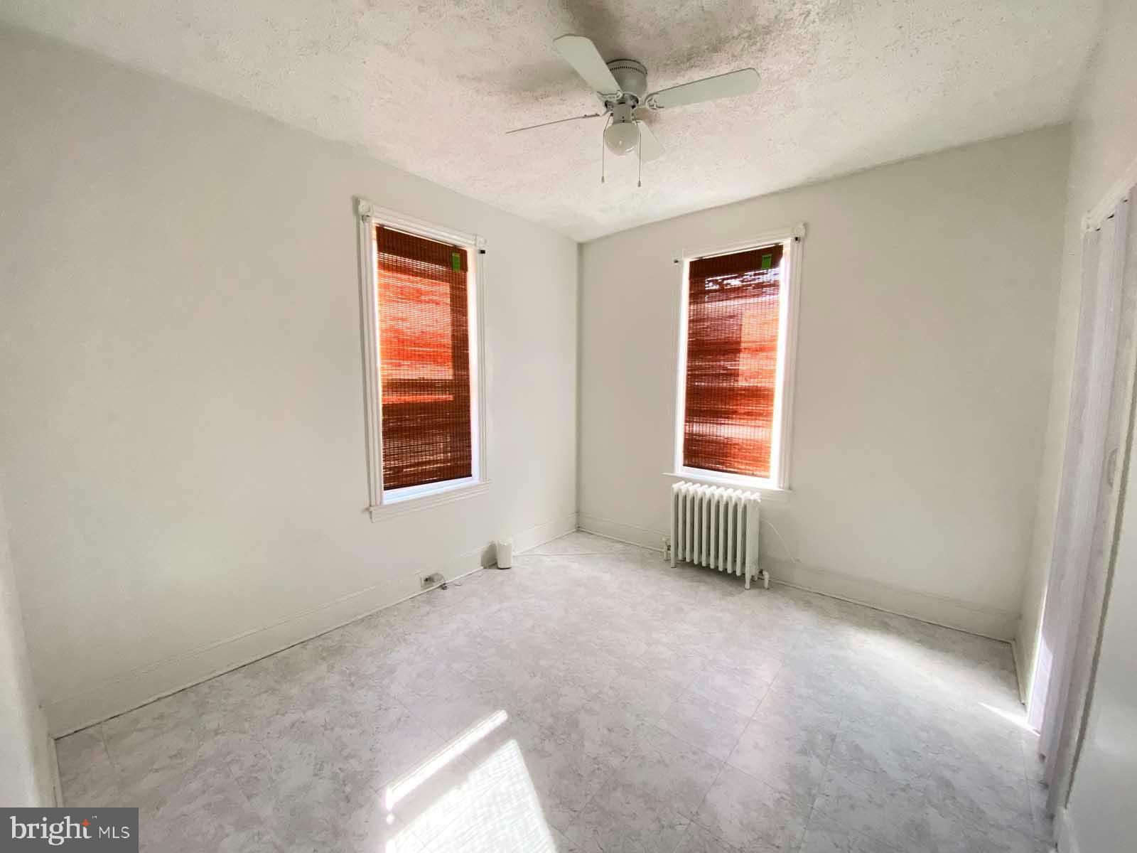 538 West Pike Street Philadelphia, PA 19140 - Photo 21 of 34 a view of an empty room with a window