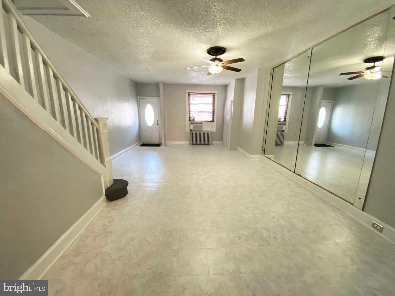 538 West Pike Street Philadelphia, PA 19140 - Photo 7 of 34 a view of a hallway with staircase