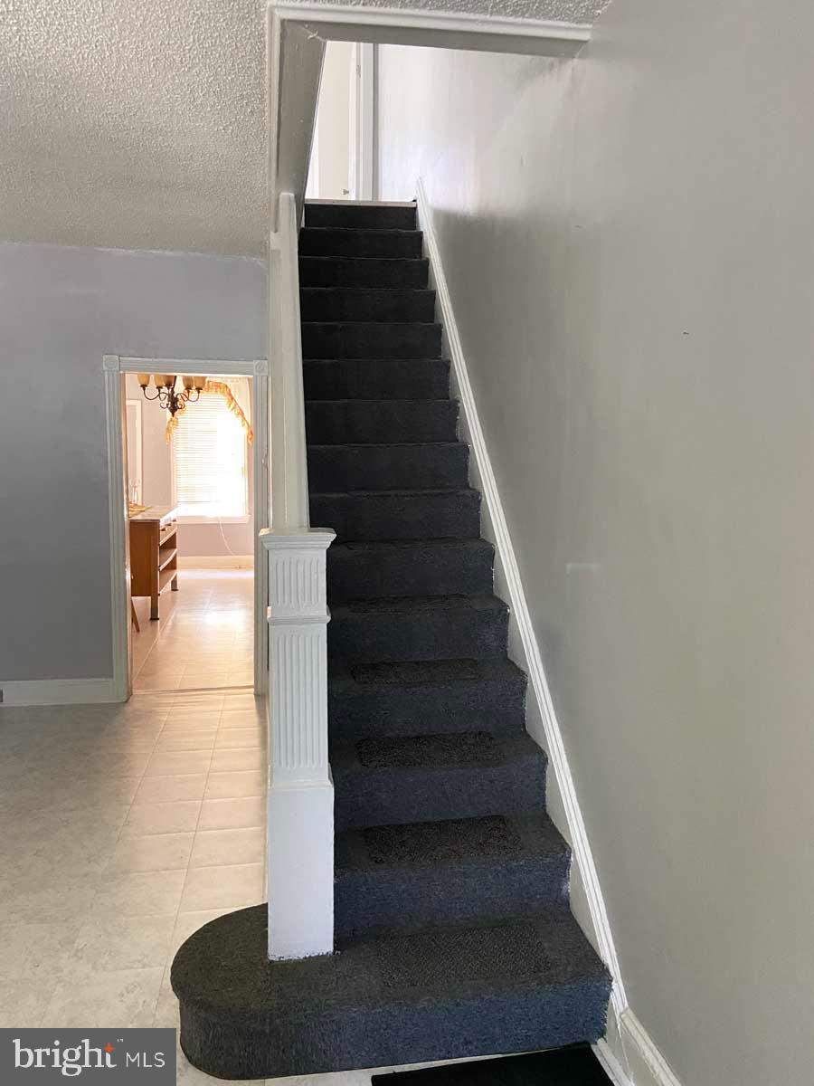 538 West Pike Street Philadelphia, PA 19140 - Photo 10 of 34 a view of entryway and hall with wooden floor