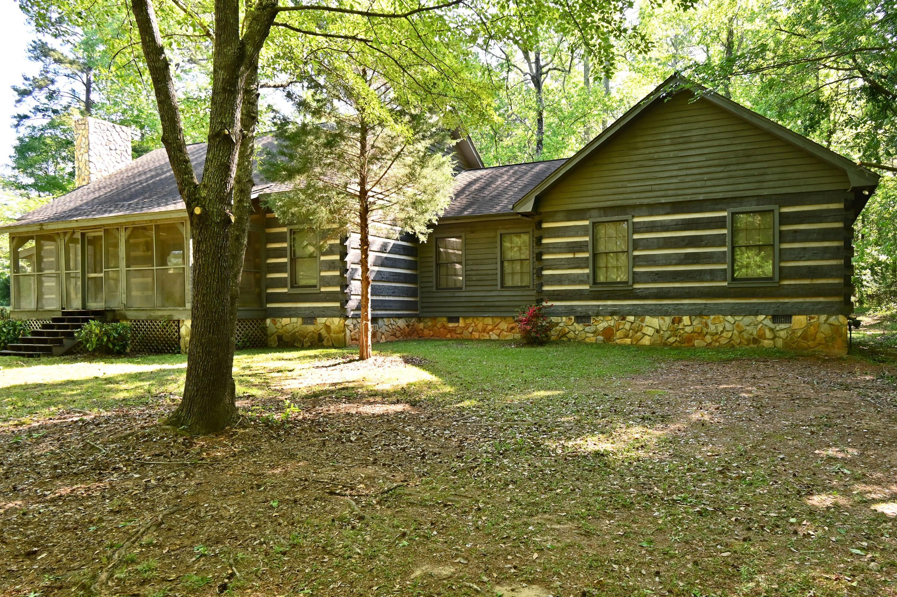10333 Estes Road Macon, GA 31210 - Photo 15 of 29 a front view of a house with a yard
