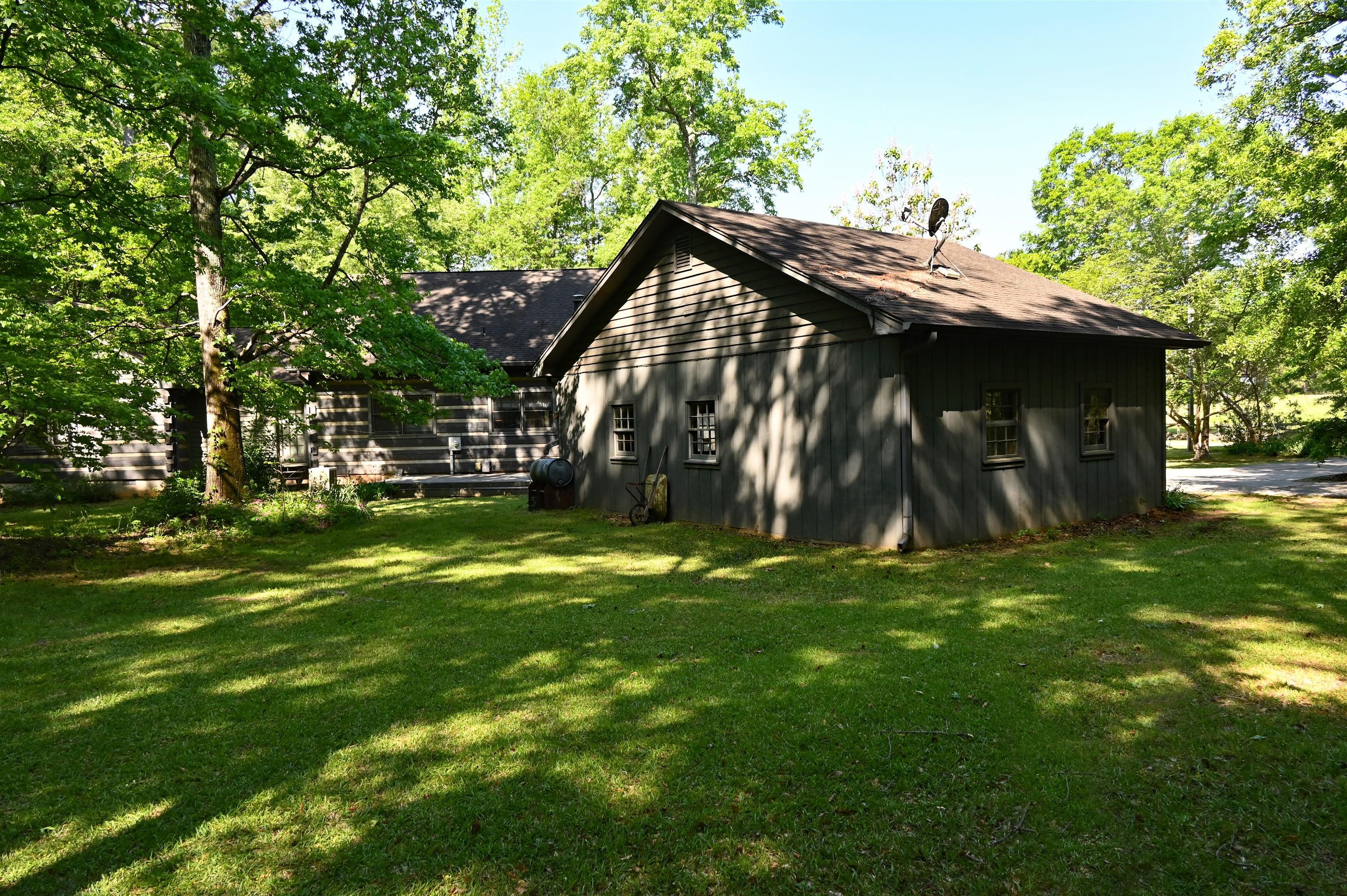 10333 Estes Road Macon, GA 31210 - Photo 18 of 29 a view of backyard of house with green space