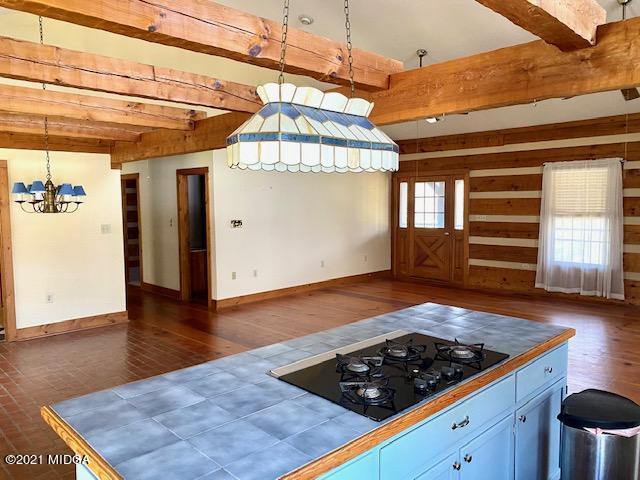 10333 Estes Road Macon, GA 31210 - Photo 3 of 29 a view of a room with wooden floor and cabinets