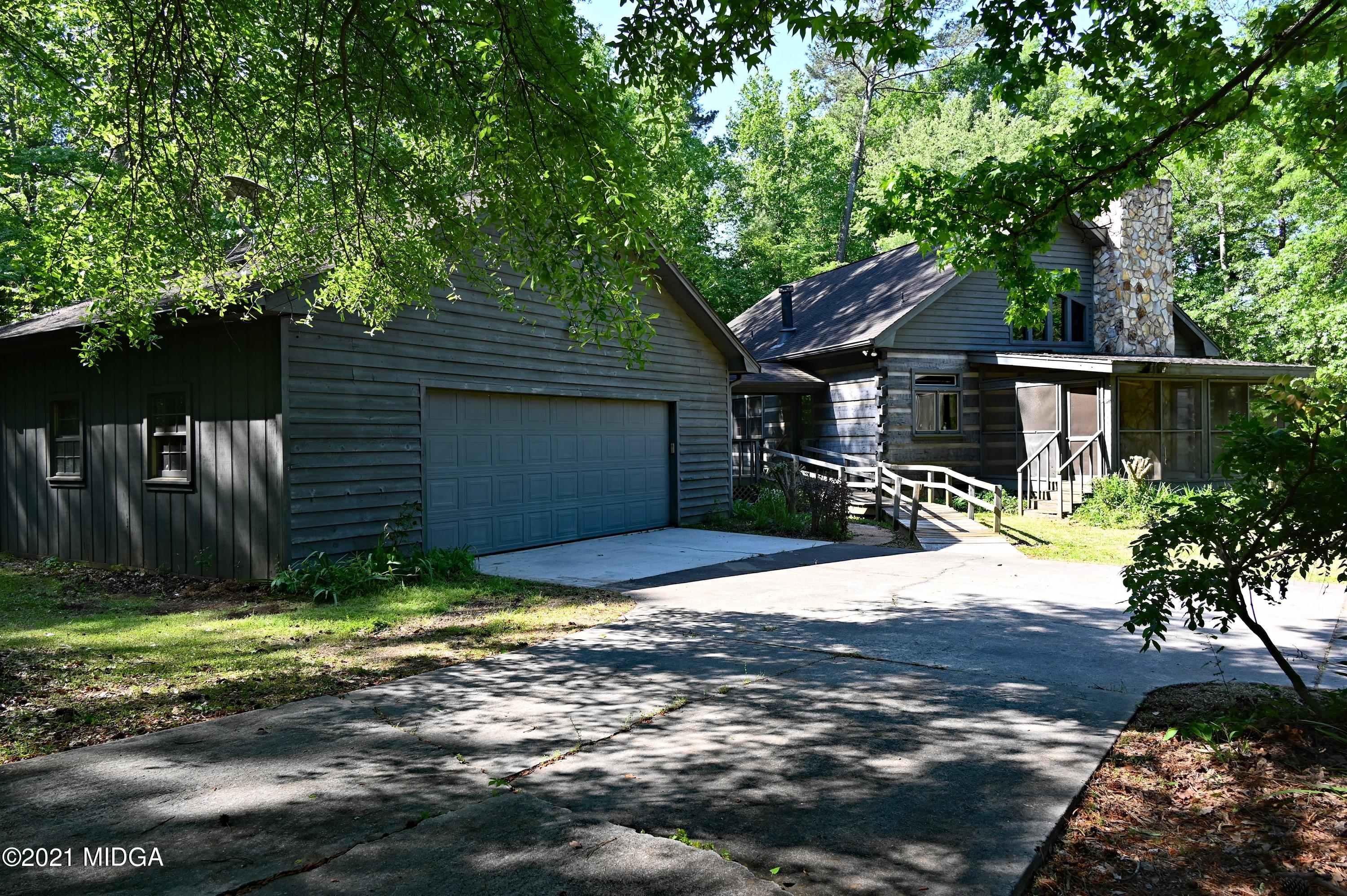 10333 Estes Road Macon, GA 31210 - Photo 21 of 29 a house view with a backyard space