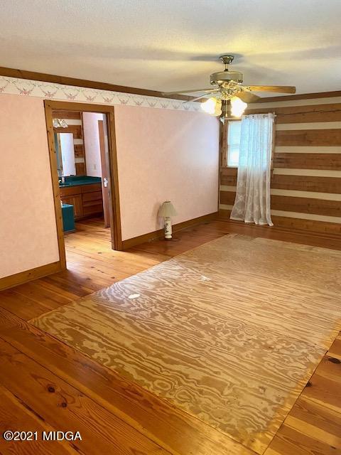 10333 Estes Road Macon, GA 31210 - Photo 6 of 29 a view of a livingroom with a staircase