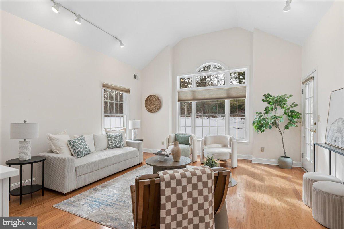 45 Hedge Row Road Princeton, NJ 08540 - Photo 12 of 29 a living room with furniture a rug and white walls