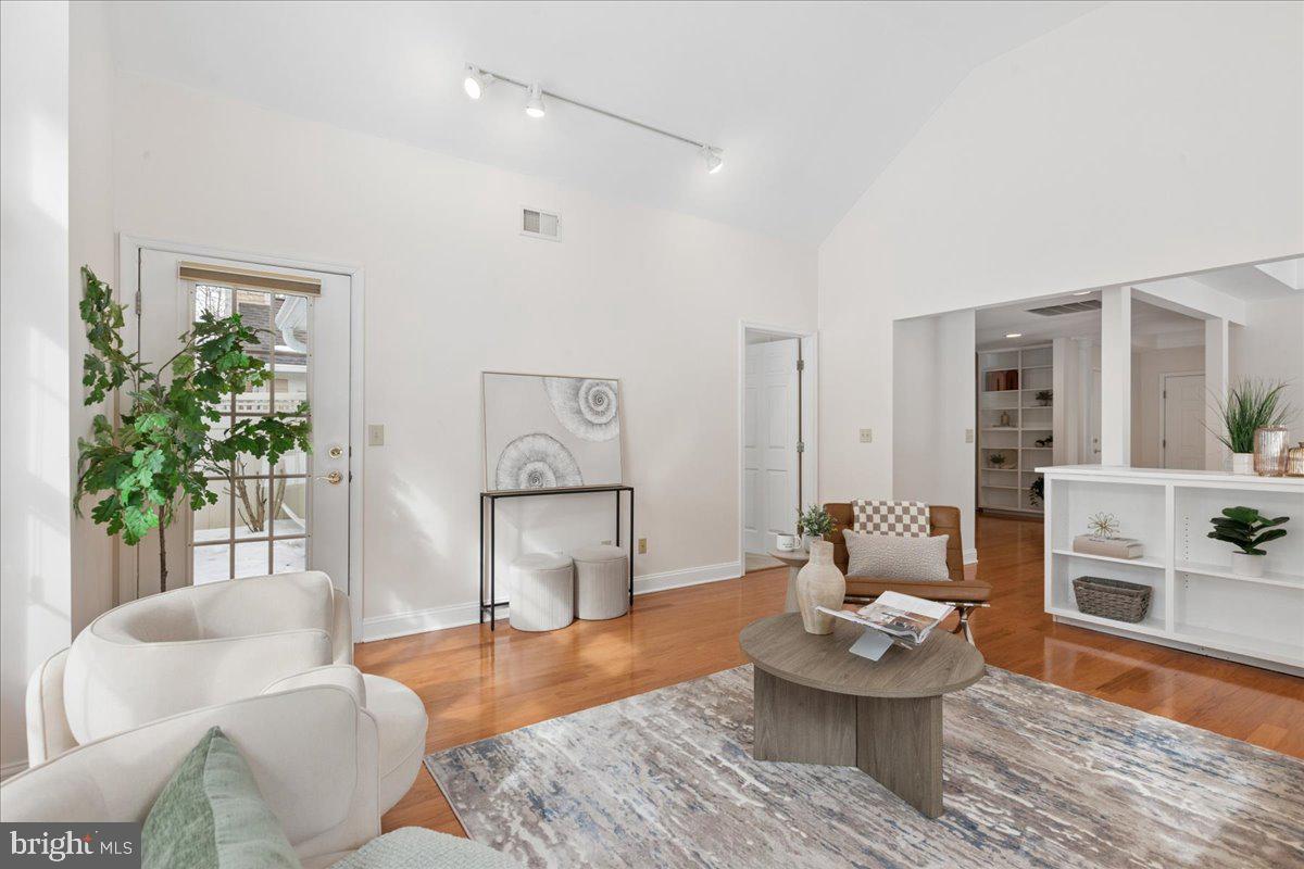 45 Hedge Row Road Princeton, NJ 08540 - Photo 13 of 29 a living room with furniture and a potted plant