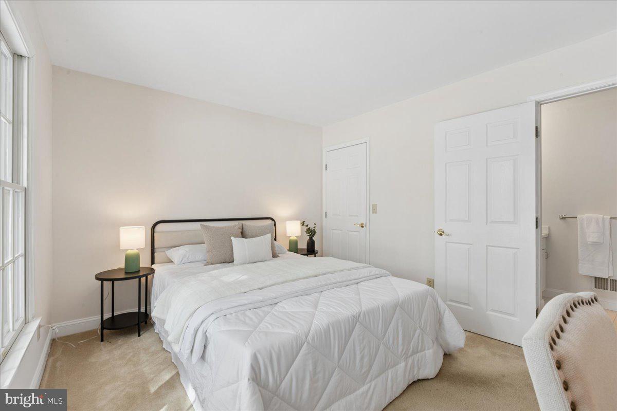 45 Hedge Row Road Princeton, NJ 08540 - Photo 16 of 29 a bedroom with a bed and a couch