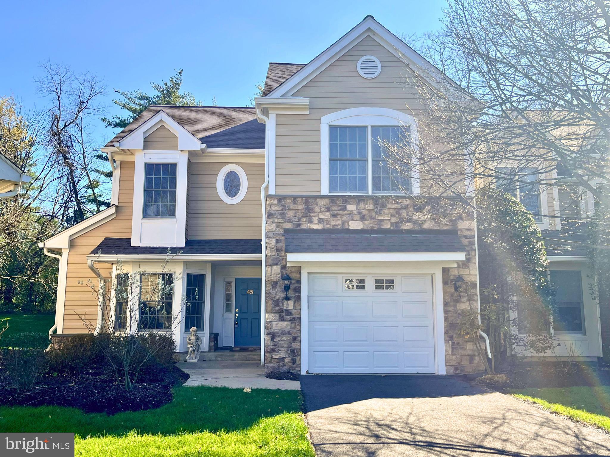 45 Hedge Row Road Princeton, NJ 08540 - Photo 2 of 29 a front view of a house with garden