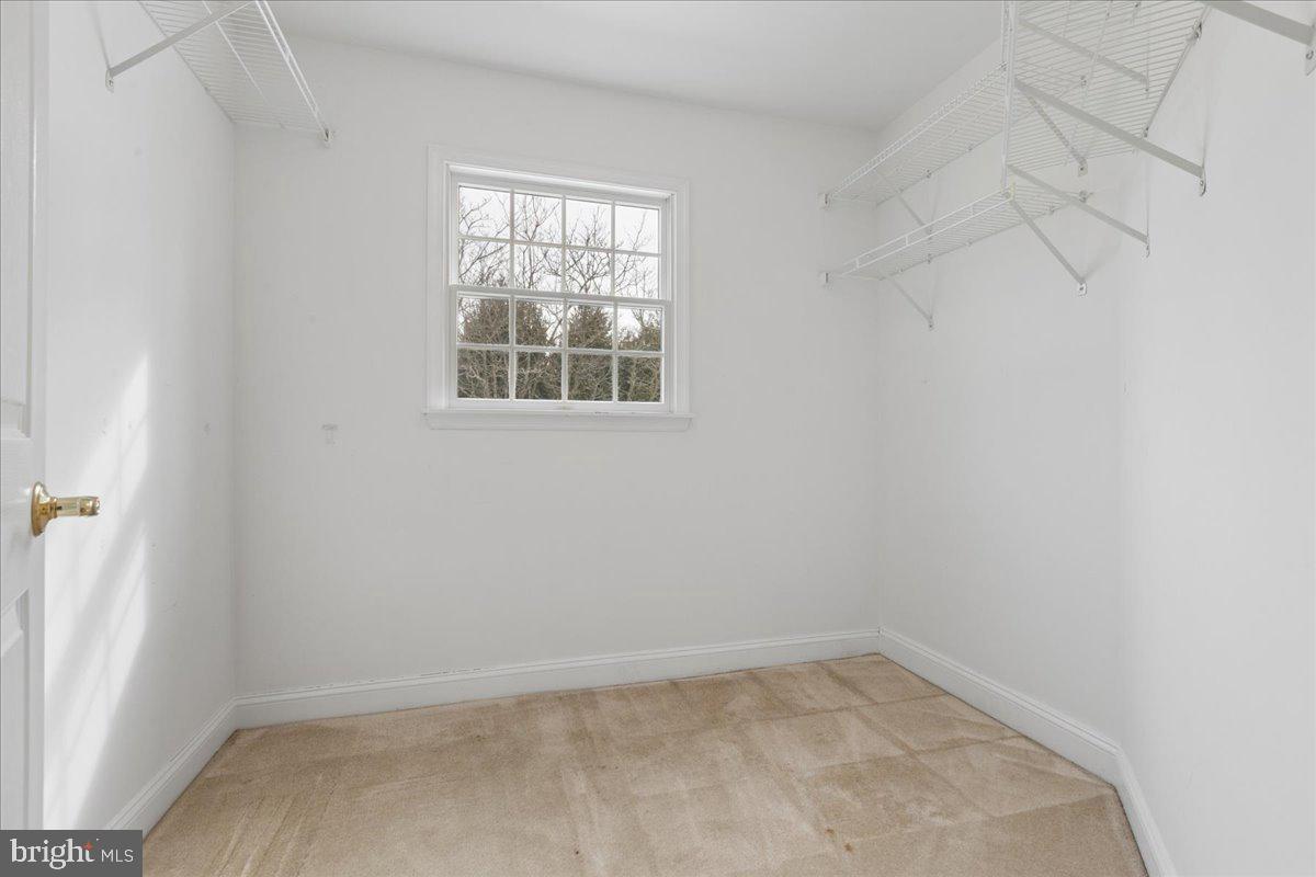 45 Hedge Row Road Princeton, NJ 08540 - Photo 24 of 29 an empty room with a window