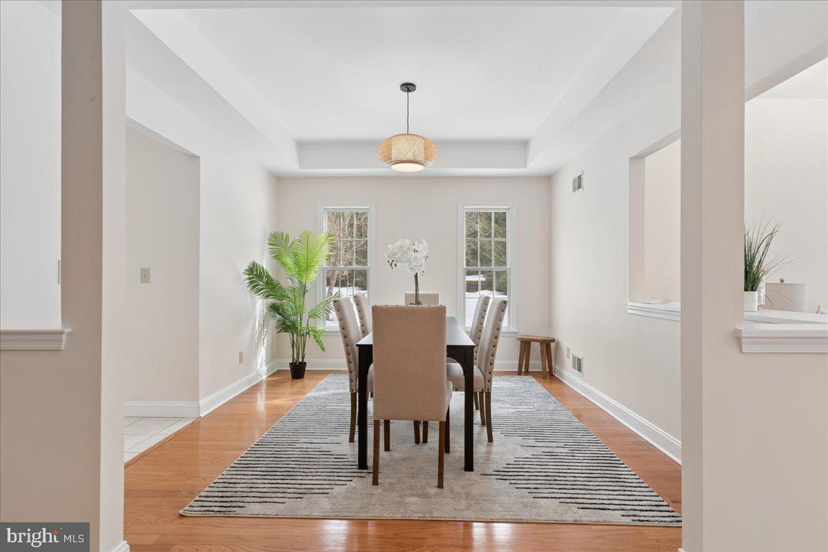 45 Hedge Row Road Princeton, NJ 08540 - Photo 10 of 29 a view of a dining room with furniture window and wooden floor