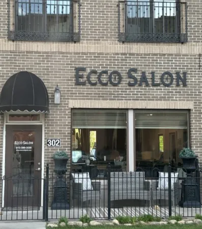a view of a car parked in front of a building