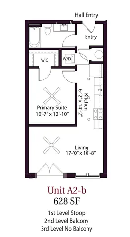 a front view of a building with a garden and plants