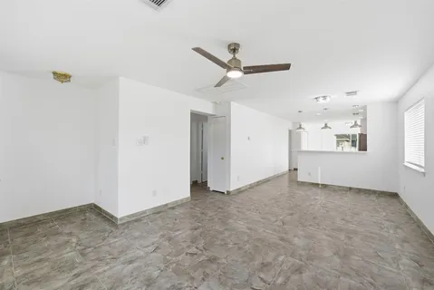 a view of a back yard of the house