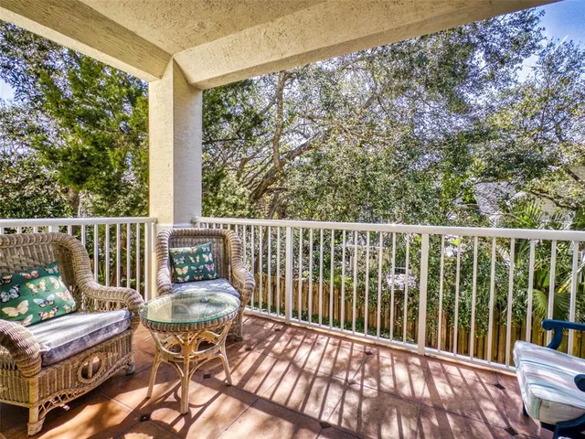 swimming pool view with a seating space