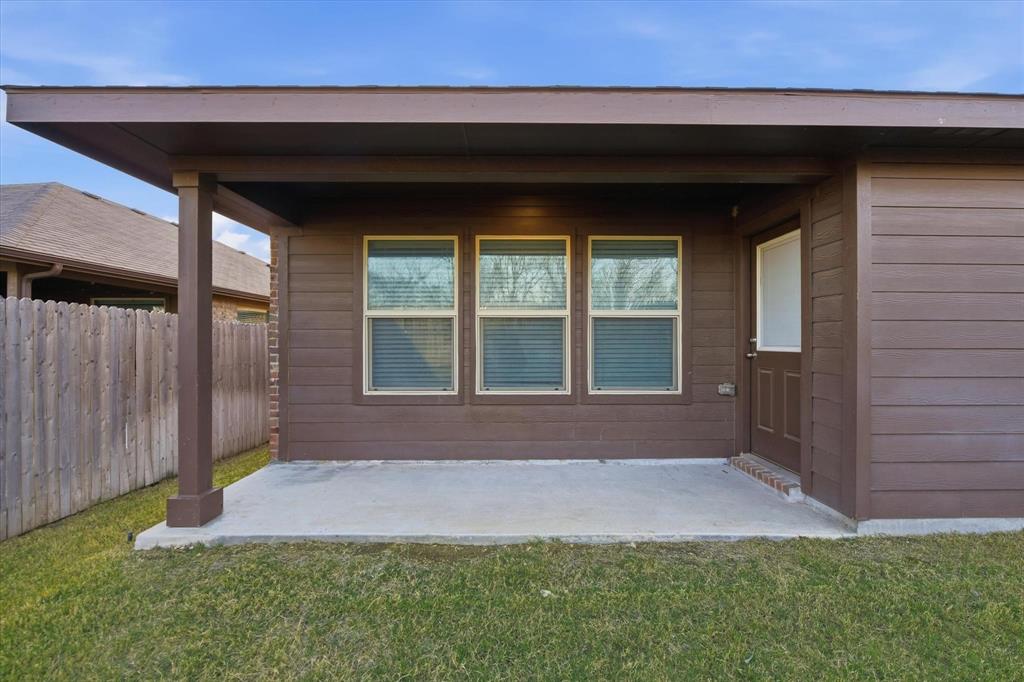 9308 Desertrock Road Fort Worth, TX 76131 - Photo 27 of 29 a view of front door of house