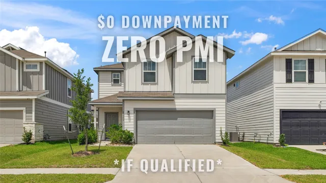 a view of a white house with a yard