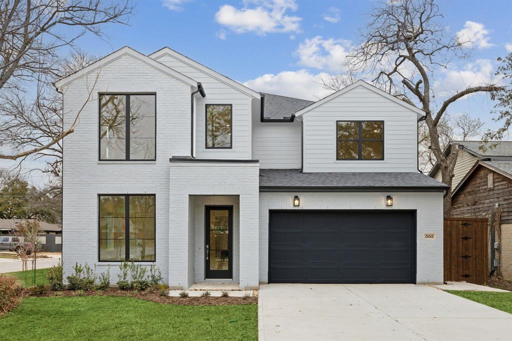 552 Brookhurst Drive Dallas, TX 75218 - Photo 1 of 1 a front view of a house with garden