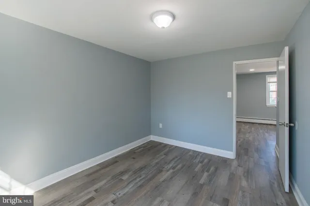 a bathroom with a toilet and a sink