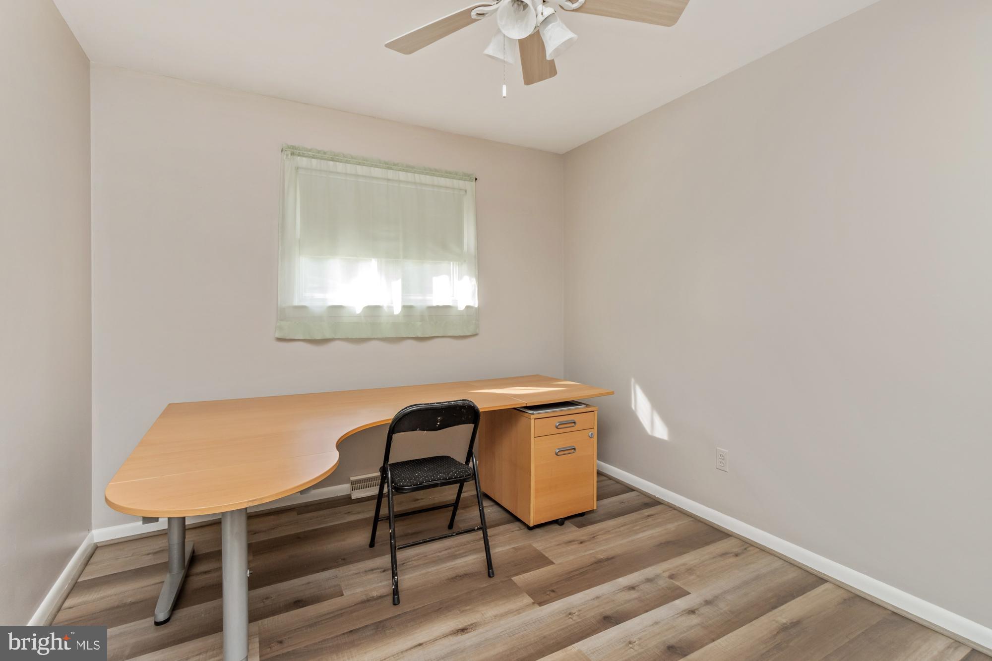3622 Claires Lane Baltimore, MD 21220 - Photo 25 of 43 a view of a workspace with furniture