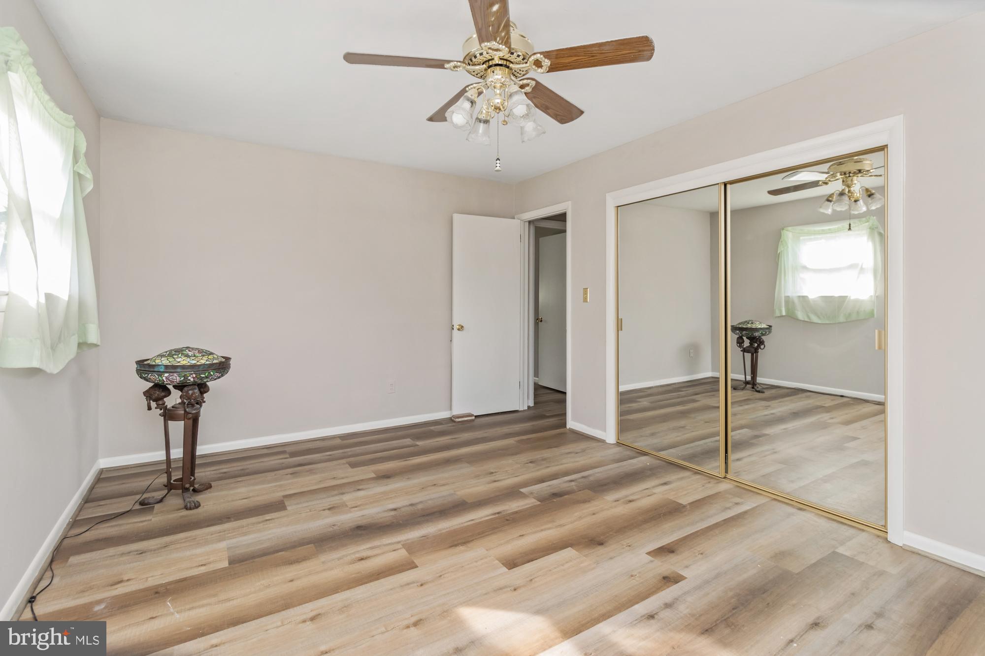 3622 Claires Lane Baltimore, MD 21220 - Photo 31 of 43 a view of empty room with a ceiling fan
