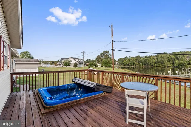 a view of a balcony with furniture