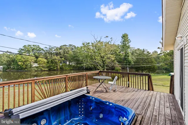 a view of a balcony with wooden floor
