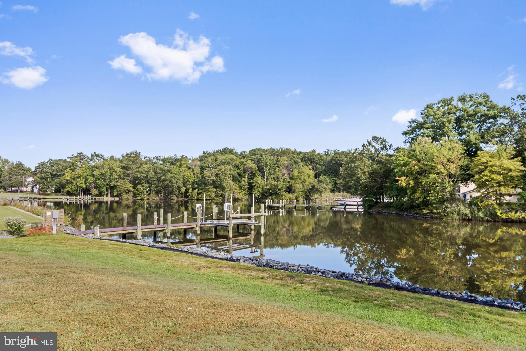 3622 Claires Lane Baltimore, MD 21220 - Photo 43 of 43 a view of a lake with a mountain in the background