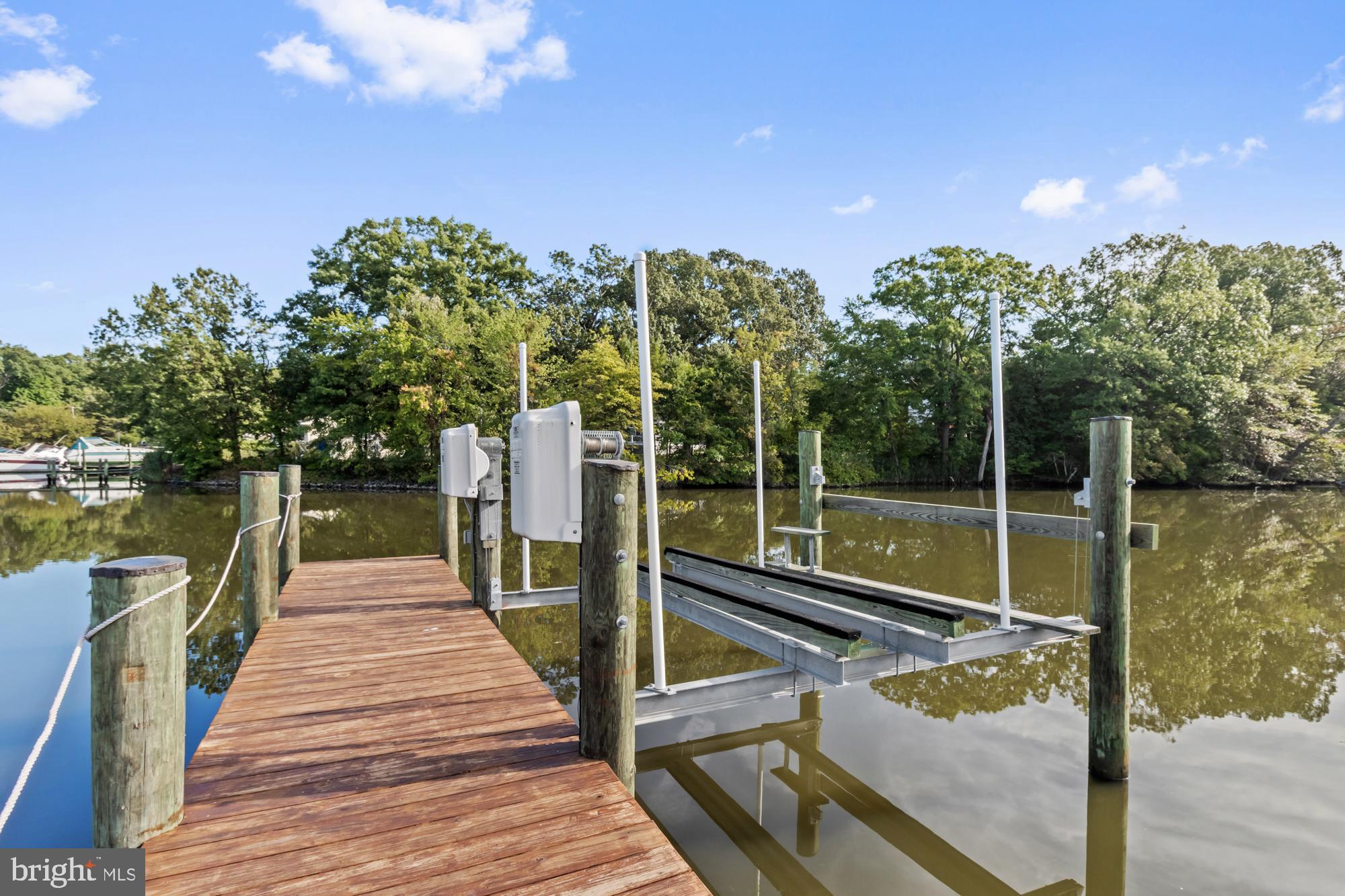 3622 Claires Lane Baltimore, MD 21220 - Photo 5 of 43 a view of a balcony with lake view and a floor to ceiling window