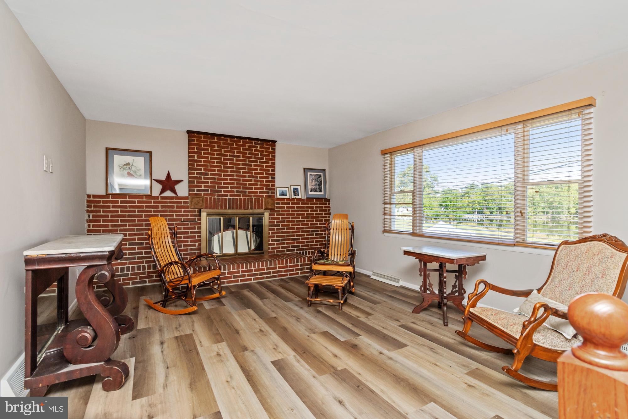 3622 Claires Lane Baltimore, MD 21220 - Photo 10 of 43 a view of a workspace with furniture and a window