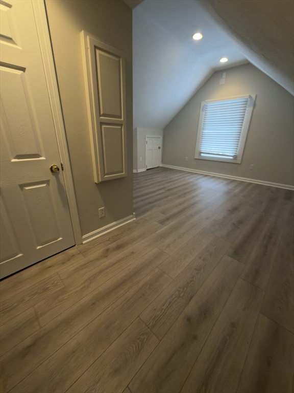 43 Sherman Street, Unit 2 Foxboro, MA 02035 - Photo 16 of 24 an empty room with wooden floor and windows