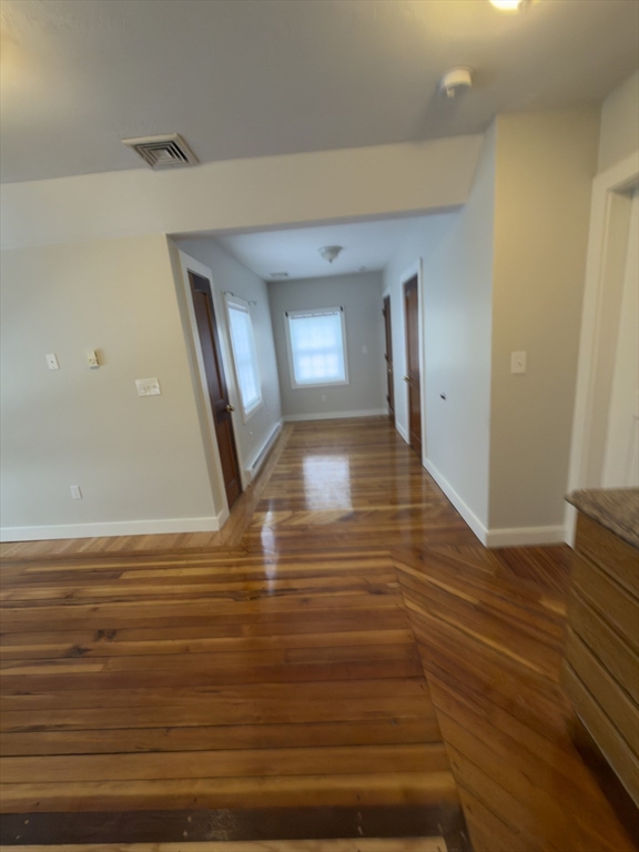43 Sherman Street, Unit 2 Foxboro, MA 02035 - Photo 3 of 24 a view of a livingroom with wooden floor