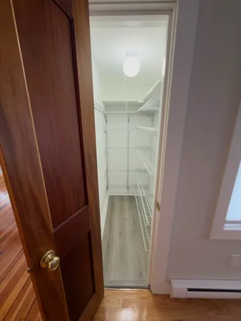 a bathroom with a toilet a sink and a shower