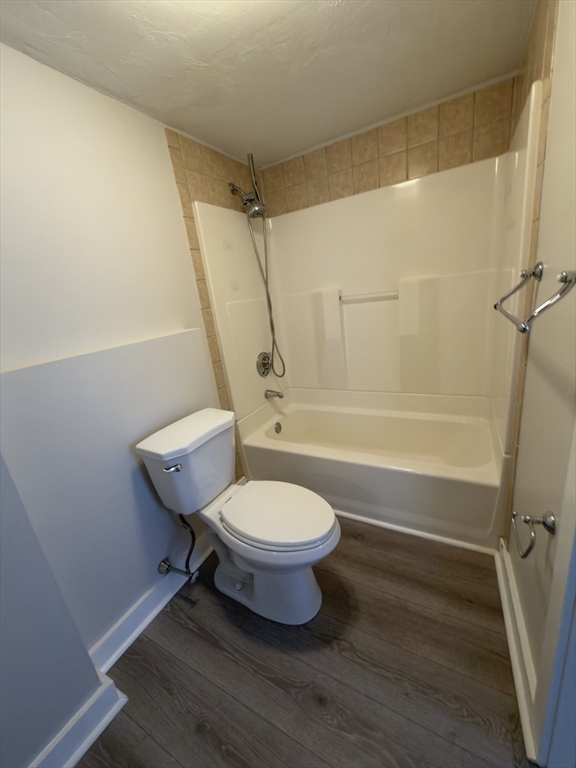 43 Sherman Street, Unit 2 Foxboro, MA 02035 - Photo 5 of 24 a bathroom with a toilet a sink and a shower