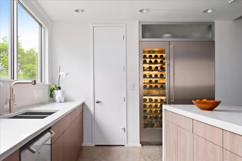 a workspace with furniture and window