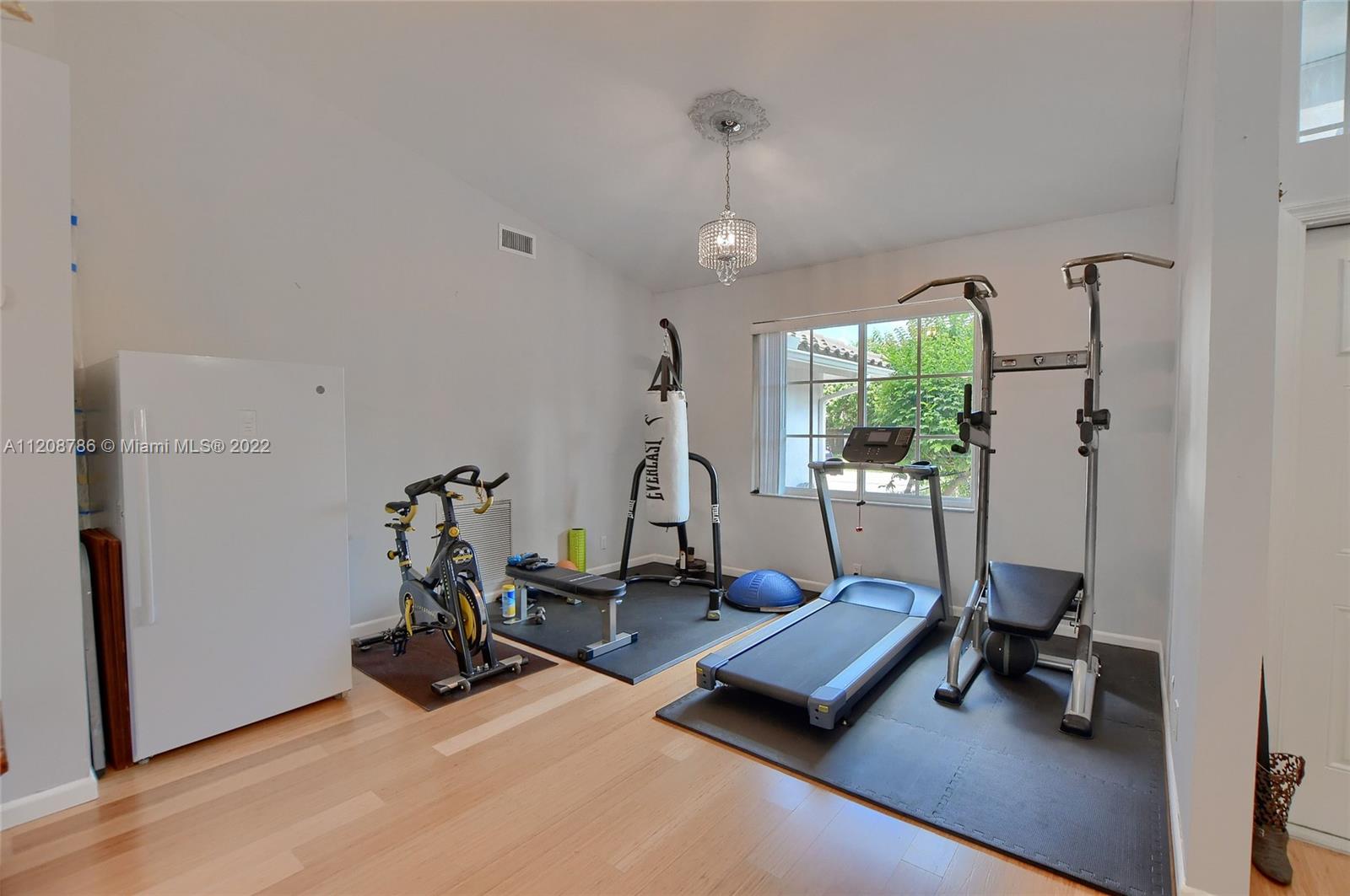 9580 Carousel Circle South Boca Raton, FL 33434 - Photo 6 of 35 a view of a room with gym equipment