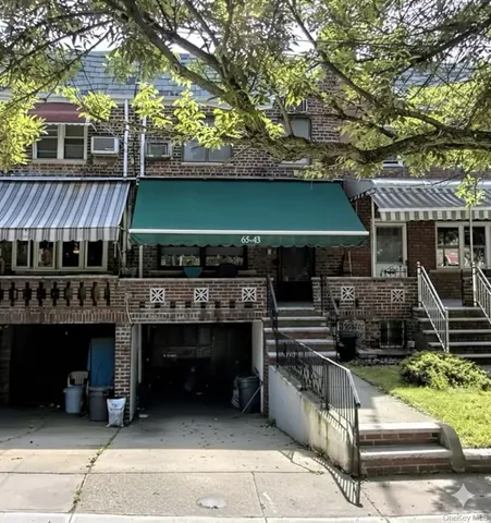 a front view of a house with a balcony