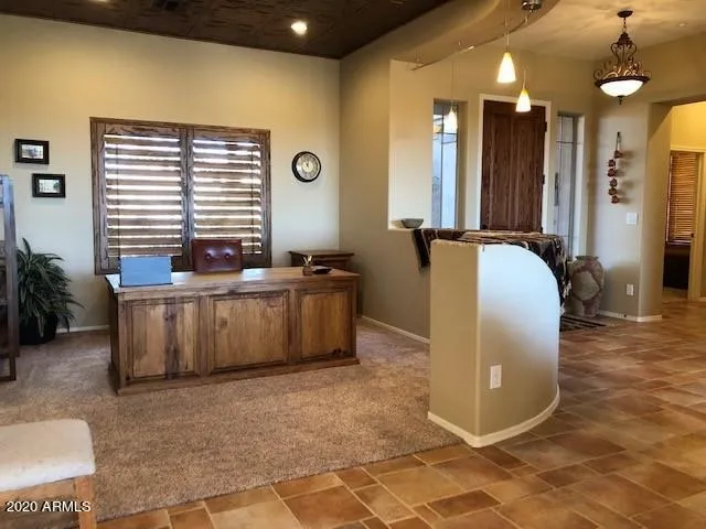 a living room with furniture and window