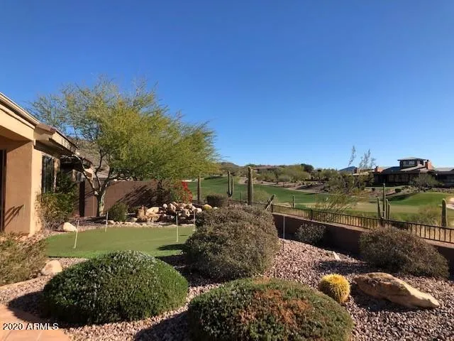 a view of a street with a building in the background