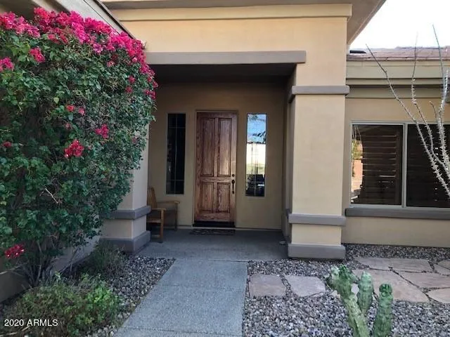 a front view of a house with a porch