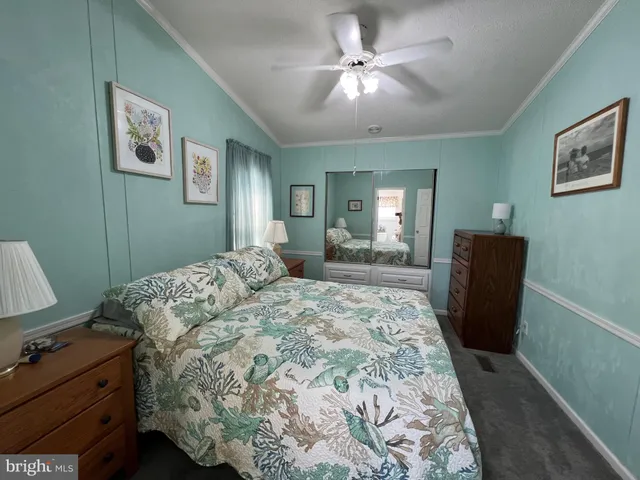 a backyard of a house with lots of green space and fountain